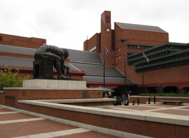 Red brick buildings with statues