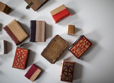 a number of small books, some of Don Taylor&amp;#039;s historical and model bookbindings