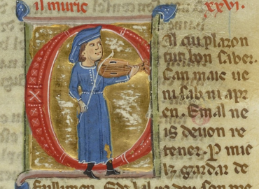 Decorated initial with a man playing a fiddle