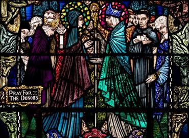 stained glass image of Saint Brigid and Saint Bishop Mel