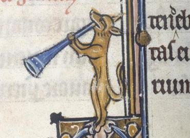 medieval illustration of a dog holding a trumpet