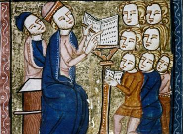 medieval illumination of a teacher and students