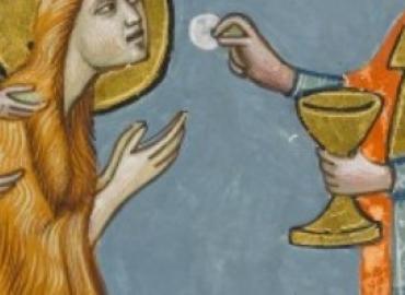 Woman receiving the Eucharist